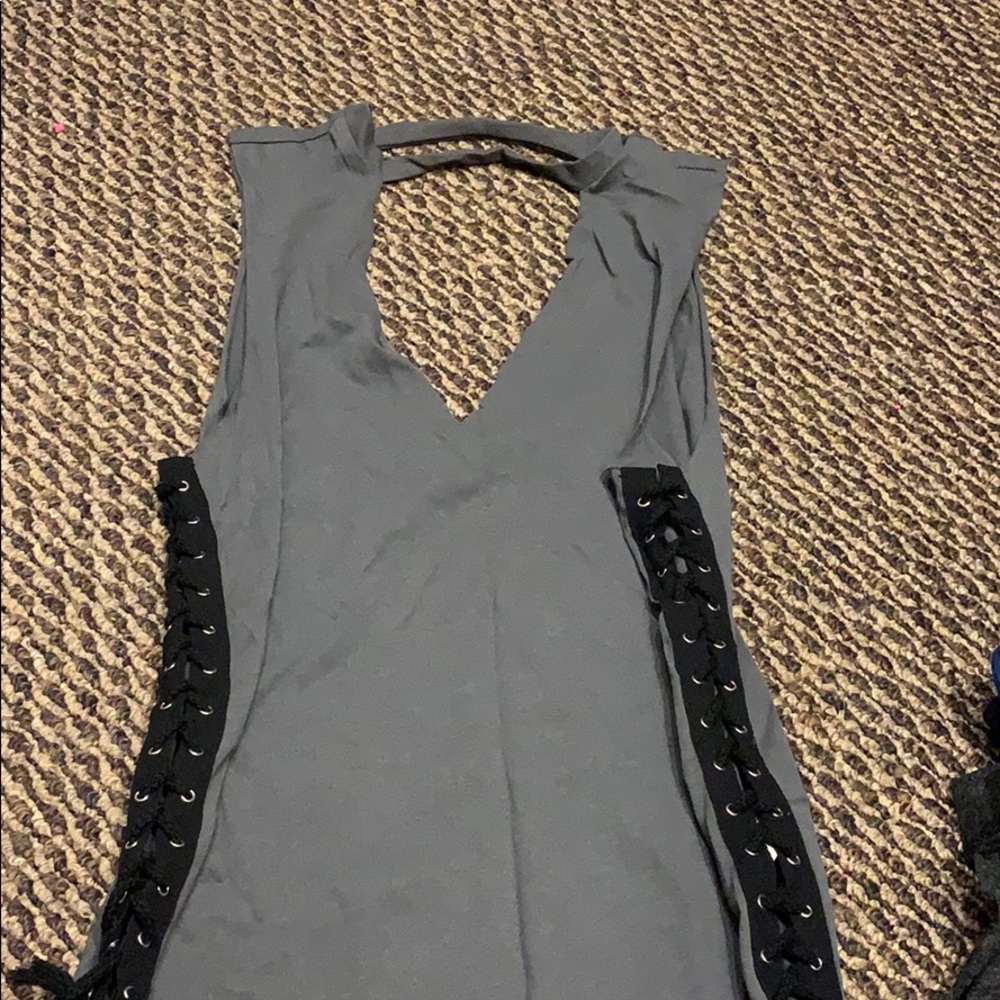 Grey tank top with black ties down the side